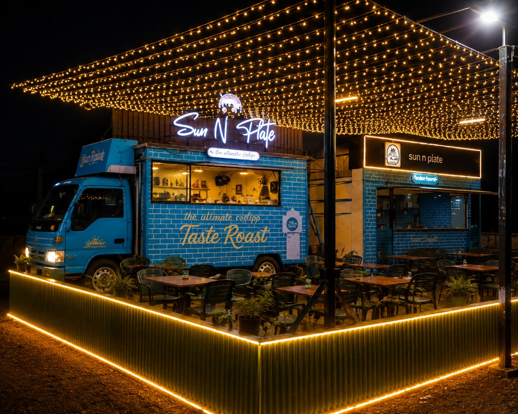 Sun n Plate truck-style restaurant glowing beneath warm string lights at night